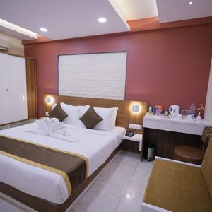 The Avenue Hotel @ Ballygunge in Kolkata (Calcutta), image may contain: Chair, Furniture, Bed, Bedroom