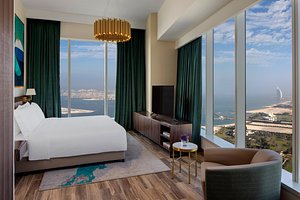 Avani+ Palm View Dubai Hotel & Suites in Dubai, image may contain: Penthouse, Monitor, Screen, Interior Design