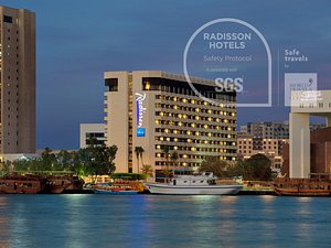 Radisson Blu Hotel, Dubai Deira Creek in Dubai, image may contain: City, Waterfront, Condo, Yacht