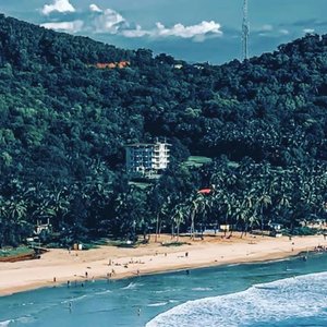 Hotel picture taken from a drone of the hotel from a distant cliff overlooking the kudle beach and then the hotel.