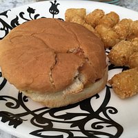 This is what you get when you order the largest burger depicted on the Sonic web site, the Quarter Pound Double Cheeseburger, along with a Large order of tater tots. Pretty pathetic.