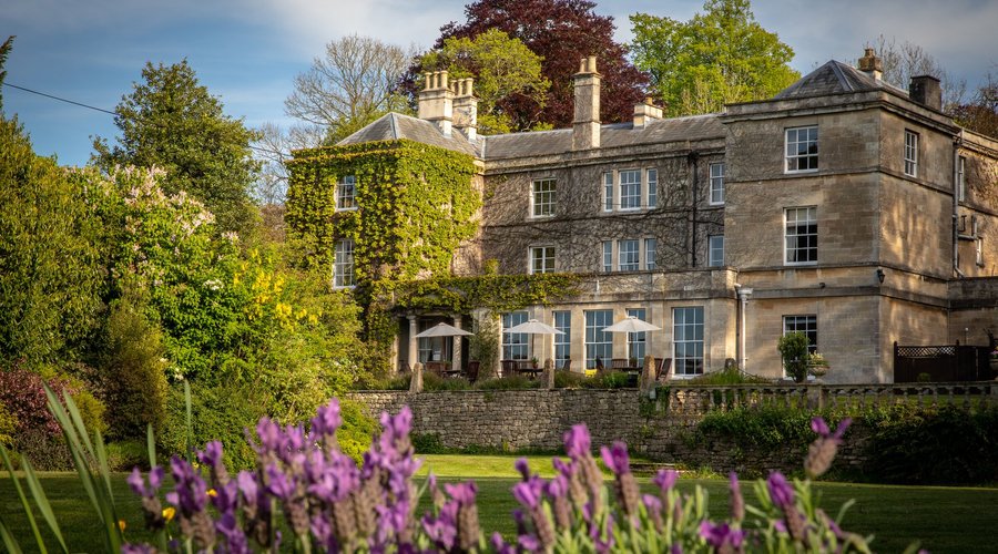 Manor house front view across lawn