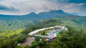 The Forest Club Resort in Karjat, image may contain: Resort, Hotel, Vegetation, Land