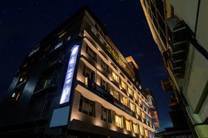 Mount Conifer Suites & Spa in Darjeeling, image may contain: Hotel, Night, City, Condo