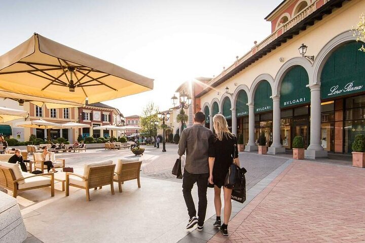 serravalle outlet prada price