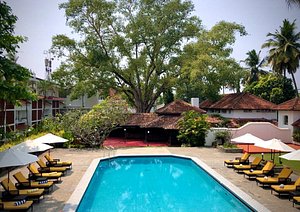 Casino Hotel, CGH Earth in Kochi (Cochin), image may contain: Hotel, Resort, Villa, Chair