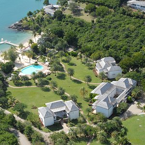 The Inn at English Harbour is set amongst nineteen acres of lush, manicured gardens on a stretch of white-sand beach, its pretty wooded headland overlooking Nelson’s Dockyard, the former British Navy base of Admiral Horatio Nelson.