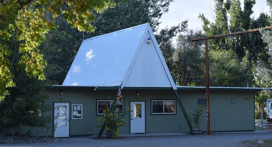 Check in at the office in the green A-frame building 2pm - 8pm.