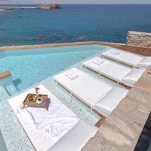 Enjoy our elegant pool with sea view for an amazing tan.