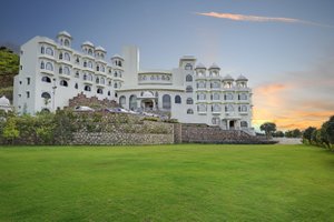Bhairavgarh Palace Udaipur in Udaipur, image may contain: Grass, Resort, Hotel, Lawn