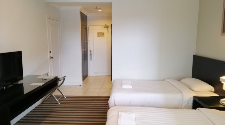 Standard Deluxe - entry view and closet on left.