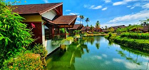 Gokulam Grand Resort & Spa, Kumarakom in Kumarakom, image may contain: Hotel, Resort, Building, Scenery