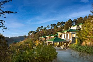 Suryavilas Luxury Resort & Spa in Solan, image may contain: Hotel, Resort, Building, Architecture