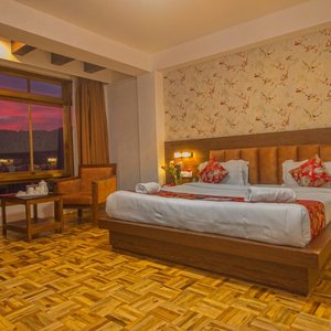 Super Deluxe Room 
This comfortable 400 sq ft room has a spacious restroom which is in western style

Amenities like free WiFi, television, intercom, electric,kettle, tea coffee maker, hair blower, geyser shower, stand fan and restaurant room services are provided 