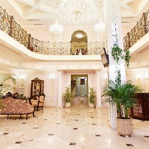 Boutique Hotel California in Odesa, image may contain: Chandelier, Dining Room, Indoors, Foyer