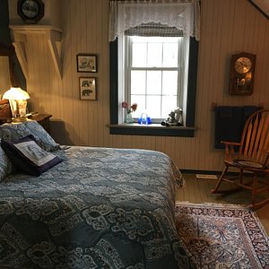 Queen room with queen sized bed overlooking the beaver pond