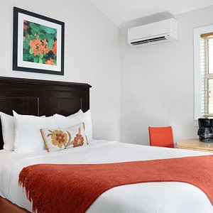 Standard Queen Room - Whether traveling solo or as a pair, sleep well in a Eurotop queen bed and enjoy complimentary Wi-Fi, microwave, refrigerator, and cable TV.