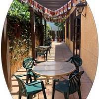 Mijares Small Side Patio outside of the Banquet Room. Perfect when your puppy joins you for lunch! Water bowls included.