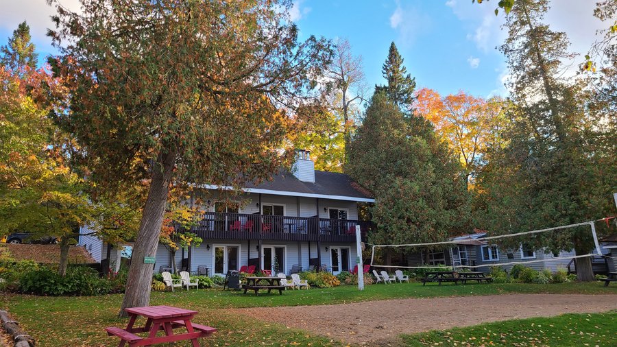 The suite building and volley ball court in the fall.