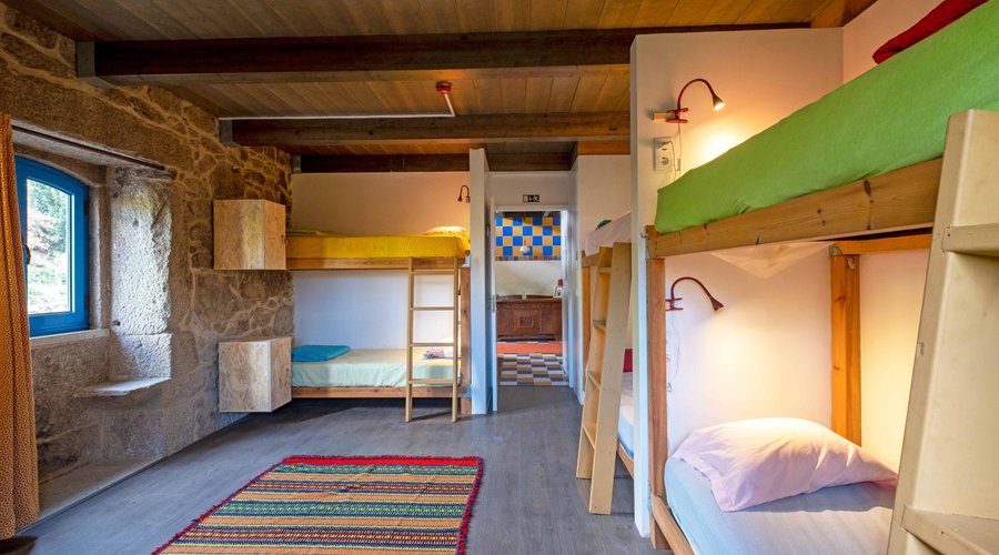 Dorm with 3 bunkbeds. 