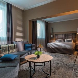 Expo Hotel in Sofia, image may contain: Interior Design, Home Decor, Laptop, Cushion