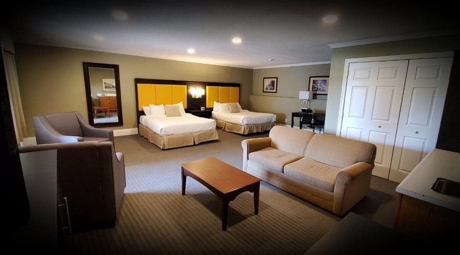 Waterfront rooms featuring 2 queen beds, sitting area & pullout couch, mini fridge & is spacious