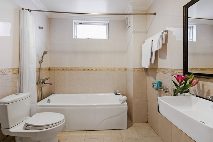 Bathroom counter with three hand towels - Picture of Flower Garden Hotel,  Ba Dinh - Tripadvisor