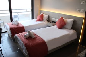 Innova8ion Hotel in Bethlehem, image may contain: Chair, Furniture, Bed