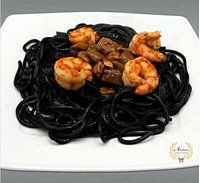 Espaguetti de sepia con langostinos y boletus