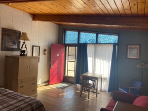 Huron Sands Motel and Restaurant in Manitoulin Island, image may contain: Lamp, Chair, Furniture, Bed