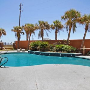 Best Western Plus Seawall Inn & Suites By The Beach in Galveston Island, image may contain: Hotel, Building, Resort, Utility Pole