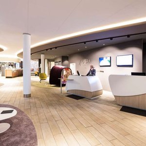 Novotel Resort & Spa Biarritz Anglet in Anglet, image may contain: Indoors, Foyer, Person, Furniture