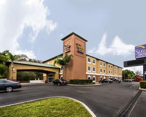Sleep Inn & Suites Orlando International Airport in Orlando, image may contain: Inn, Hotel, City, Street