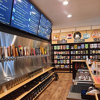 Featuring NC & VA breweries both on tap and in package. Enjoy a pint, taste a flight and take a growler to go!