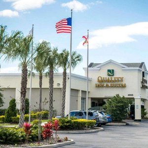 Quality Inn & Suites Near Fairgrounds Ybor City in Tampa, image may contain: Flag, Hotel, Car, Inn