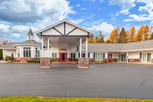 Econo Lodge Lakeshore in Manistique, image may contain: Hotel, Building, Architecture