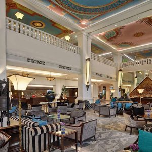 The lobby interior with a mural painting on the ceiling