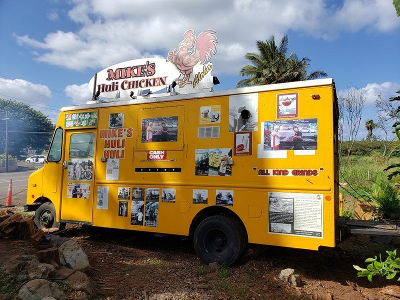 Mike’s Huli Chicken's Food Truck with Palm Trees in the background