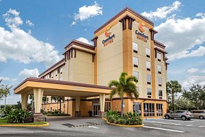 Comfort Suites Orlando Airport in Orlando, image may contain: Hotel, Inn, City, Shopping Mall