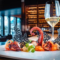 IL POLPO; grilled octopus | tomato marmalade | squid ink | potato mousse | ligurian basil