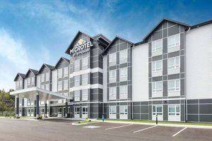 Microtel Inn & Suites by Wyndham Sudbury in Sudbury, image may contain: Office Building, Hotel, Condo, City