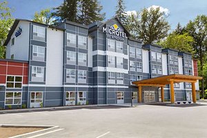 Microtel Inn & Suites by Wyndham Oyster Bay in Vancouver Island, image may contain: Hotel, City, Inn, Office Building
