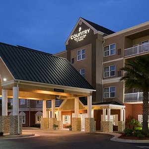 Country Inn & Suites by Radisson, Panama City Beach, FL in Panama City Beach, image may contain: Hotel, Inn, Condo, Resort