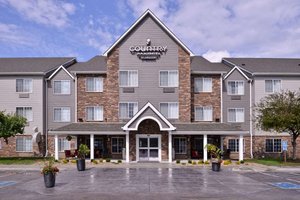Country Inn & Suites by Radisson, Omaha Airport, IA in Carter Lake, image may contain: Hotel, City, Inn, Plant