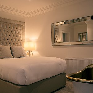 The Hotel Chester in Chester, image may contain: Interior Design, Tub, Furniture, Bedroom