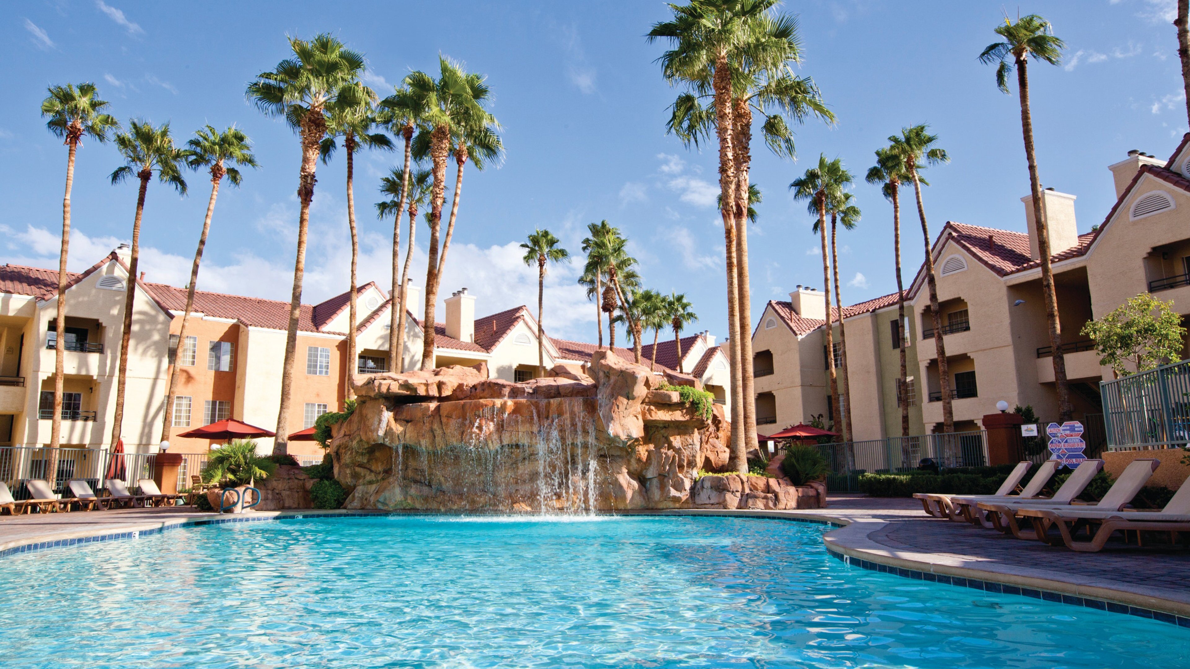 HOLIDAY INN CLUB VACATIONS AT DESERT CLUB RESORT 129 1 6 2   Pool And Waterfall Between 