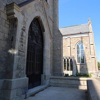 The entranc The church is beihe