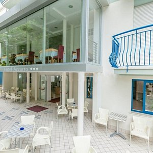 Hotel Azzurro in Cattolica, image may contain: Balcony, Cafeteria, Plant, Chair