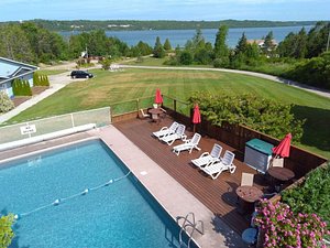 Waterview on The Bay in Wiarton, image may contain: Backyard, Pool, Scenery, Chair