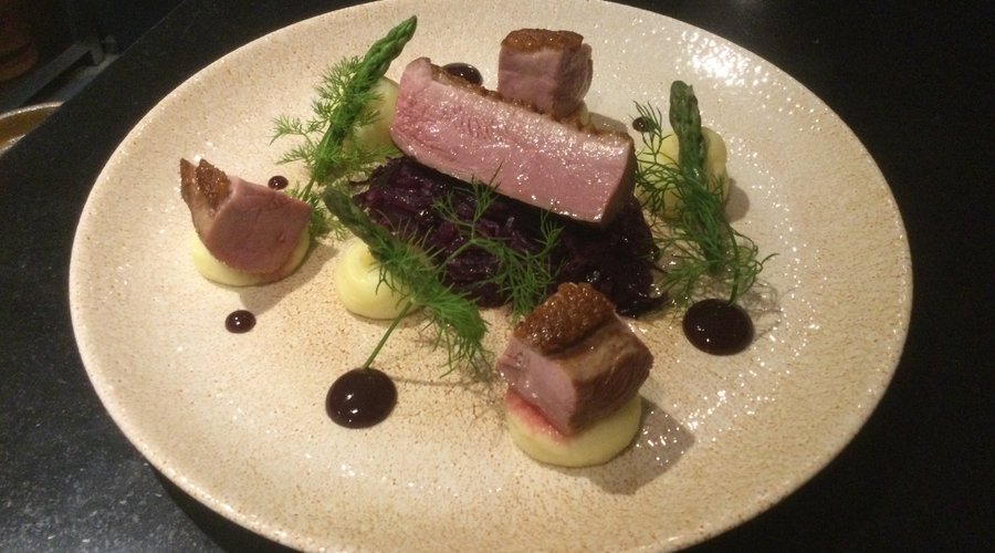 Honey roast duck breast with red cabbage and a cherry reduction